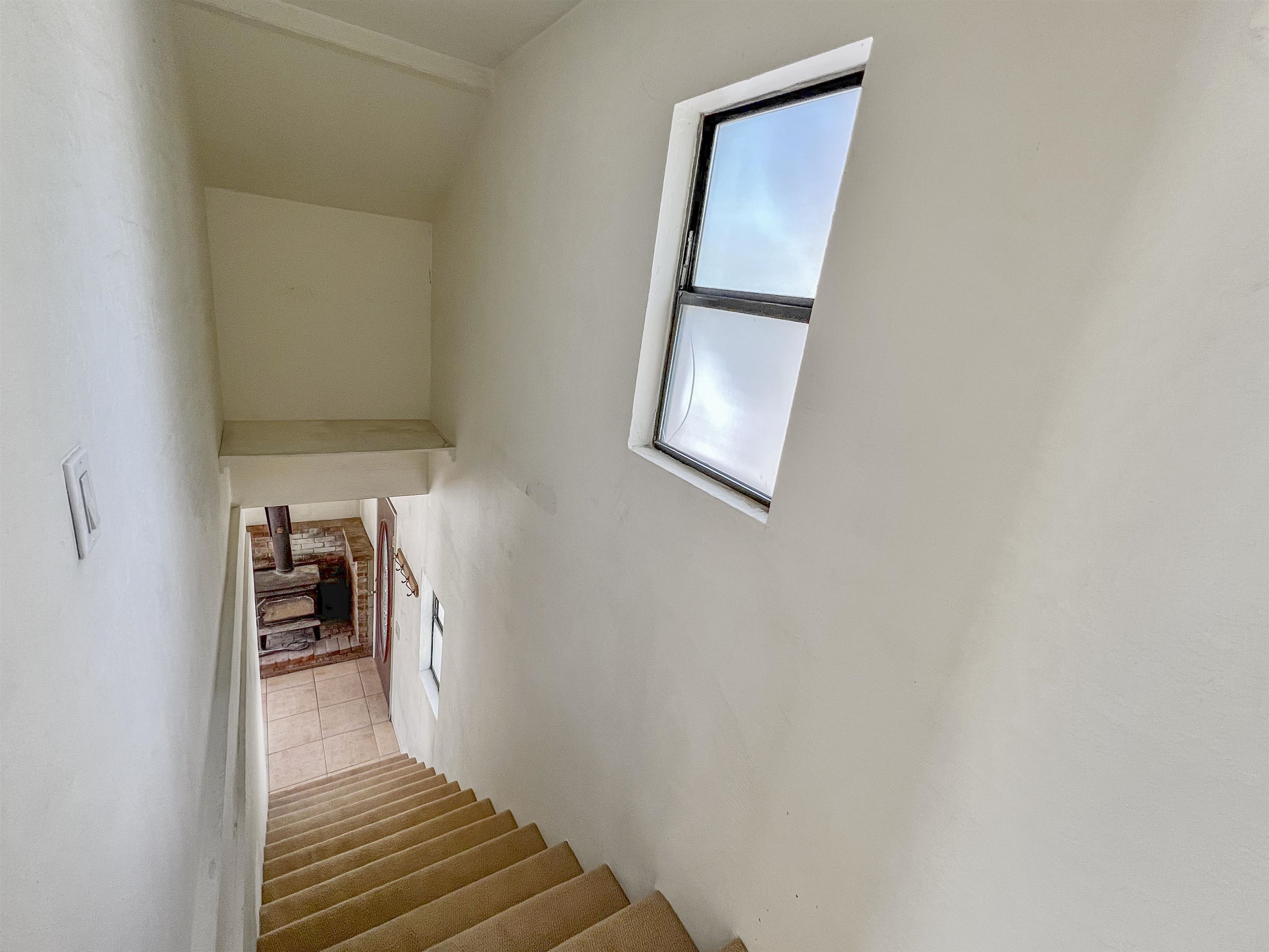 40 Gull Street Mammoth Lakes, CA 93546 - Photo 32 of 44 a view of a hallway with wooden floor and a hallway