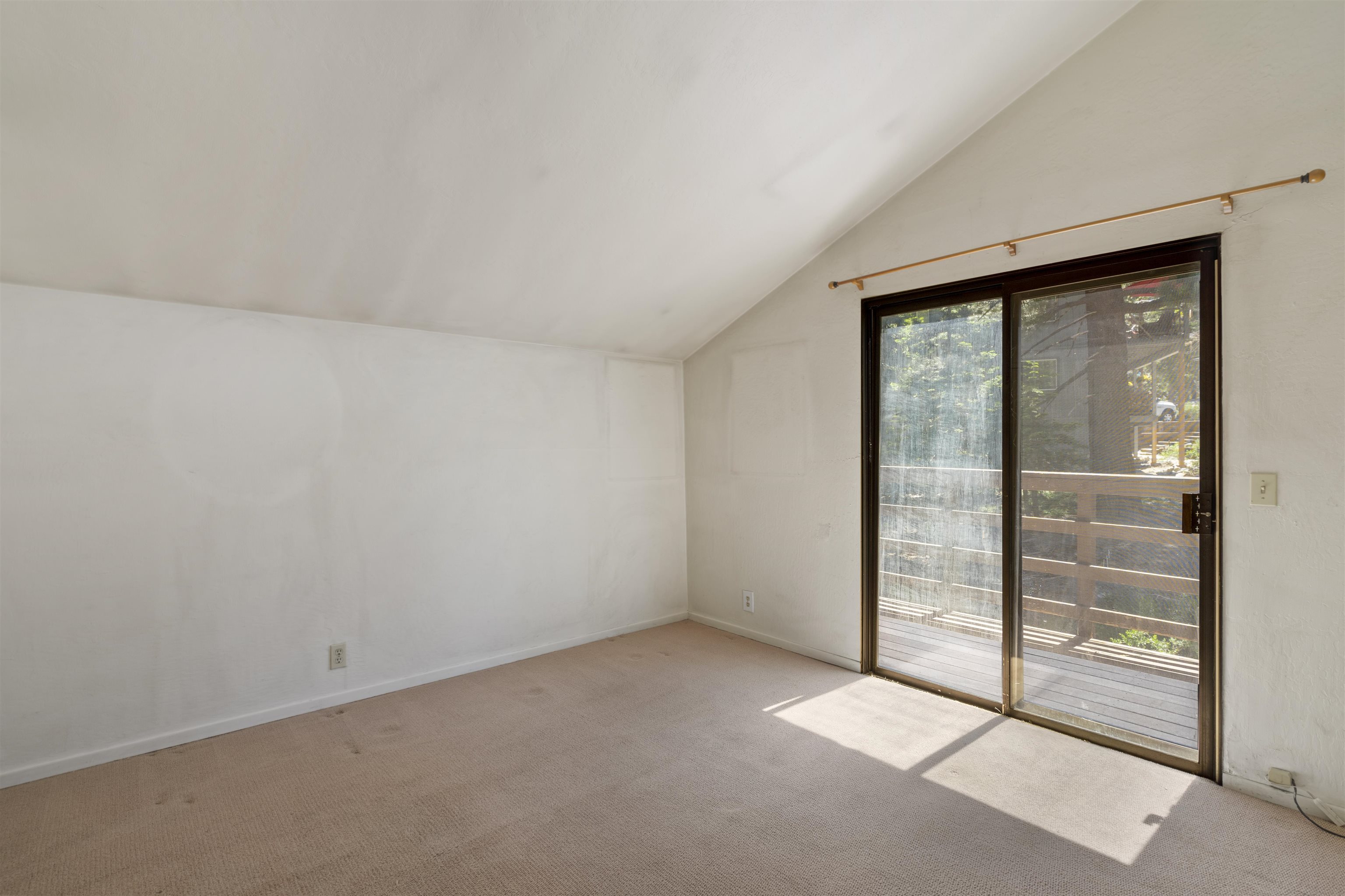 40 Gull Street Mammoth Lakes, CA 93546 - Photo 36 of 44 an empty room with sliding glass door
