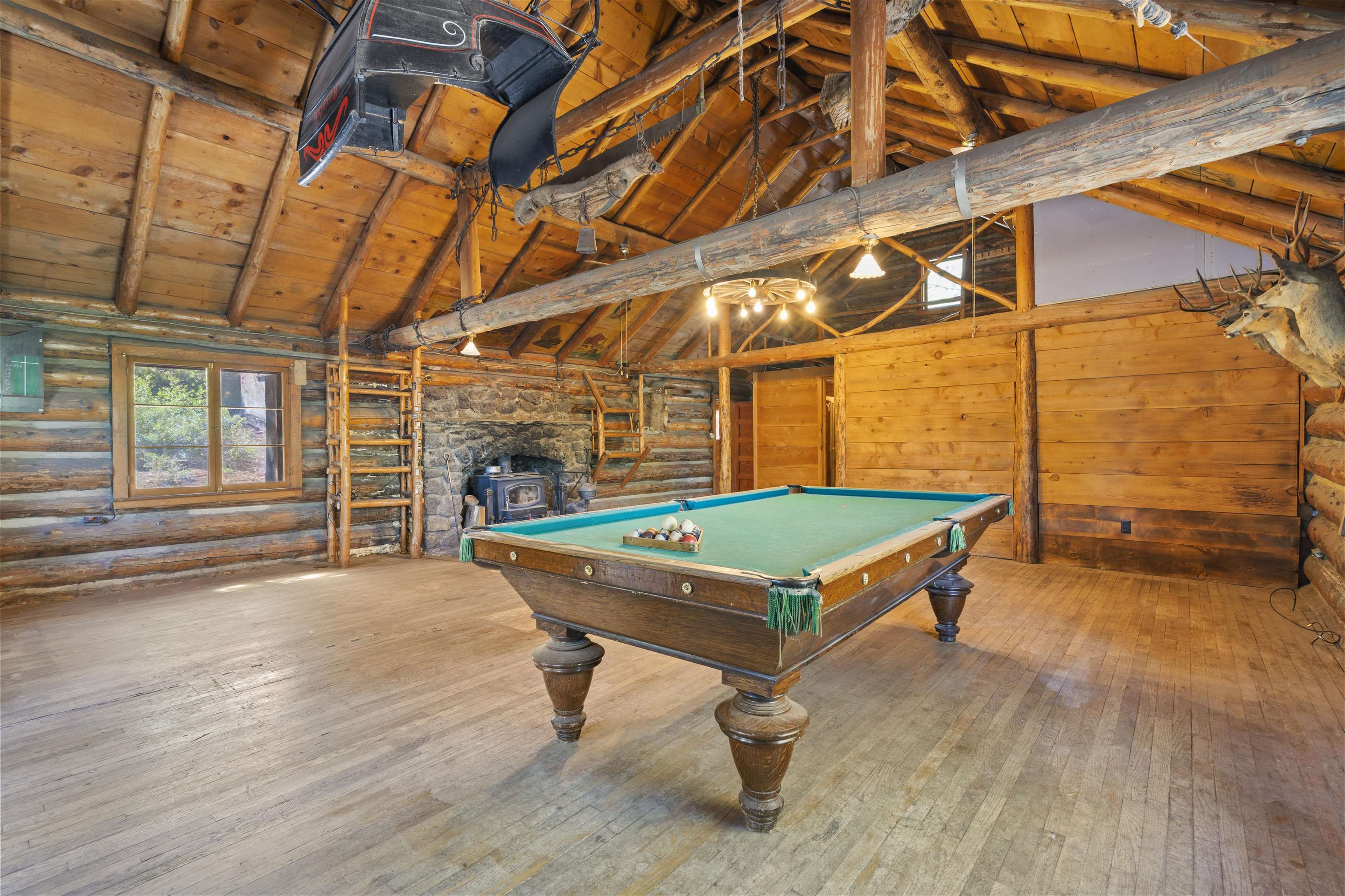 40 Gull Street Mammoth Lakes, CA 93546 - Photo 6 of 44 a room with pool table and windows