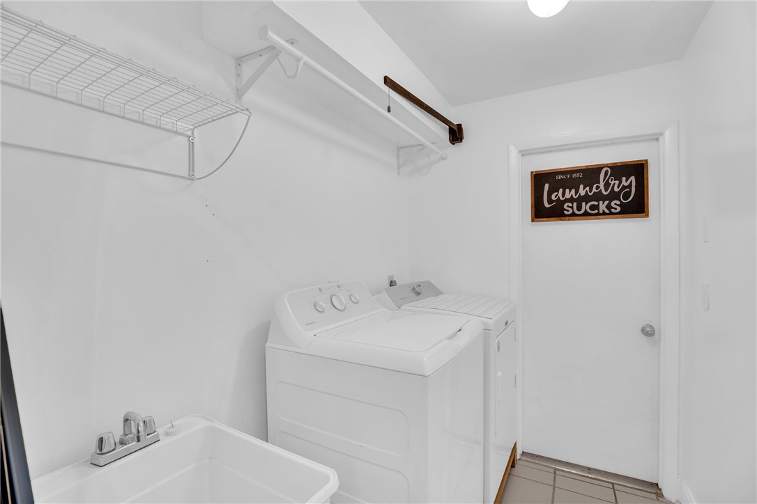 405 Columbus Street Sebastian, FL 32958 - Photo 23 of 36 a bathroom with a sink and a toilet
