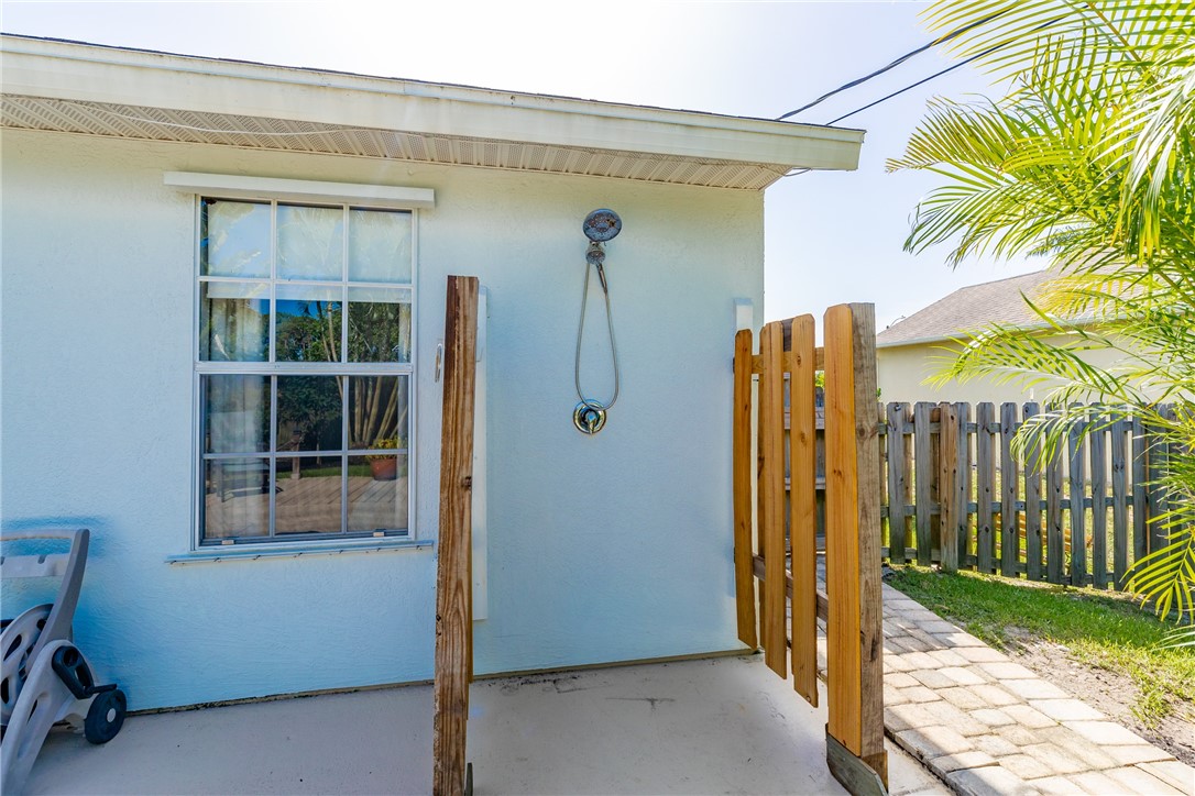 405 Columbus Street Sebastian, FL 32958 - Photo 30 of 36 a view of a house with a backyard