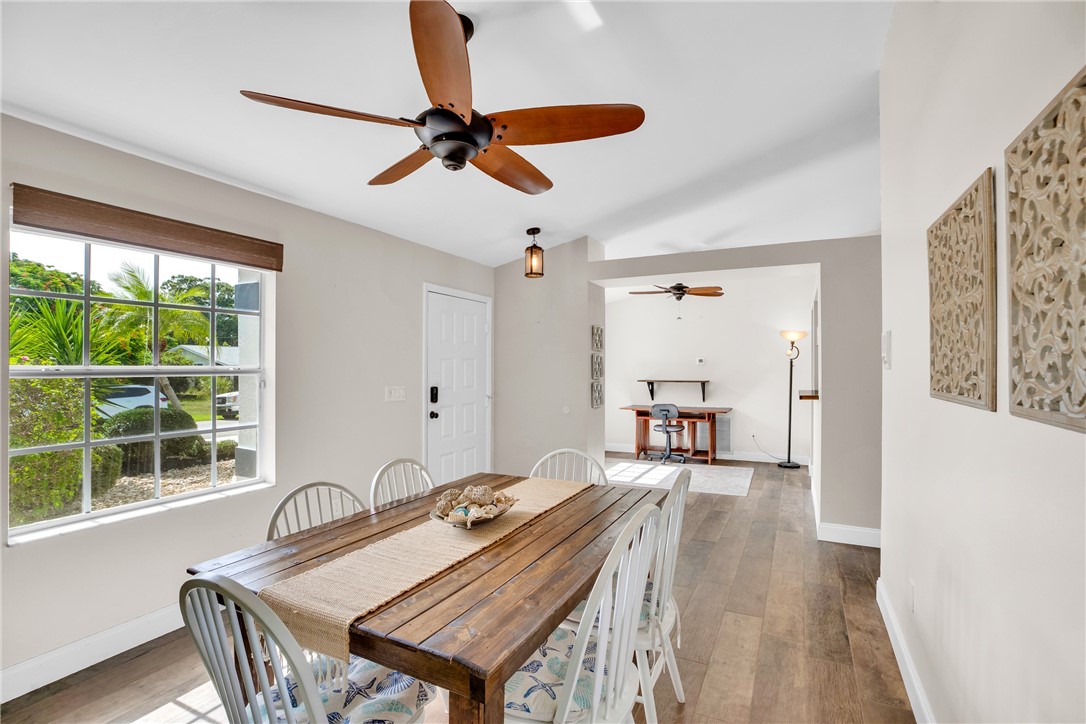 405 Columbus Street Sebastian, FL 32958 - Photo 3 of 36 a living room with furniture and a large window