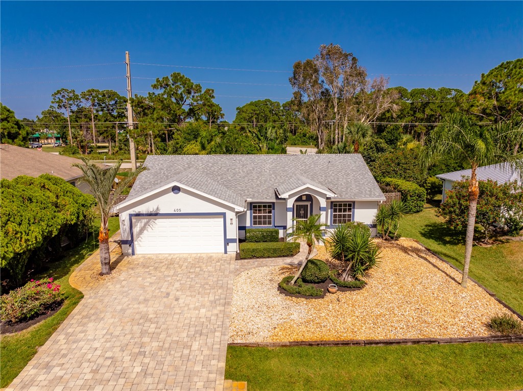 405 Columbus Street Sebastian, FL 32958 - Photo 35 of 36 front view of a house with a yard