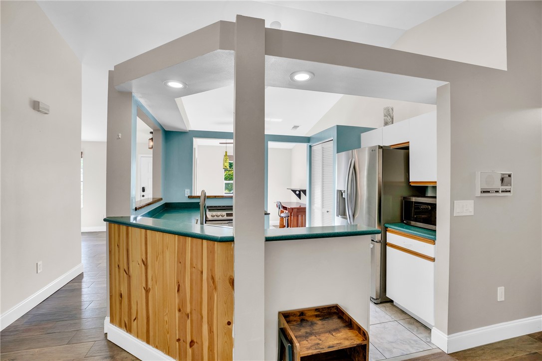 405 Columbus Street Sebastian, FL 32958 - Photo 10 of 36 a view of a kitchen with a window