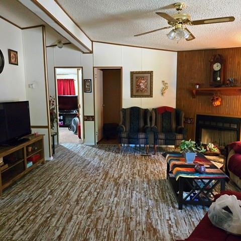 108 Elm Street Mabank, TX 75156 - Photo 13 of 22 a living room with furniture and a flat screen tv