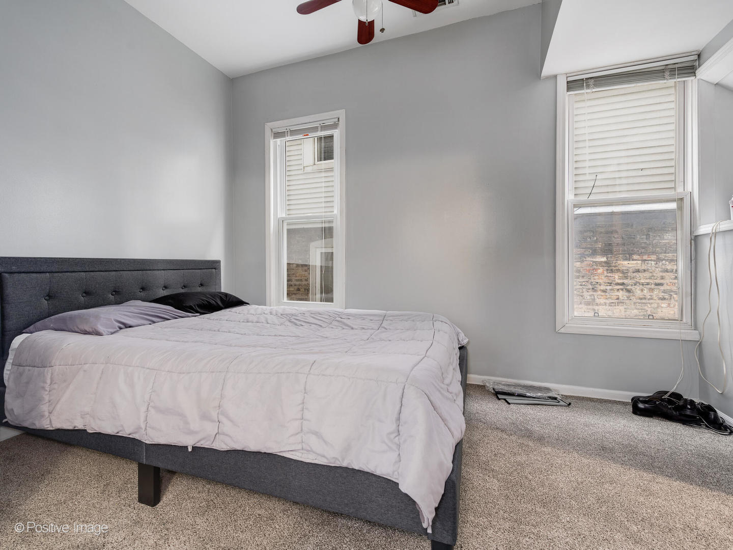 2620 West Homer Street Chicago, IL 60647 - Photo 15 of 31 a bedroom with a bed and window