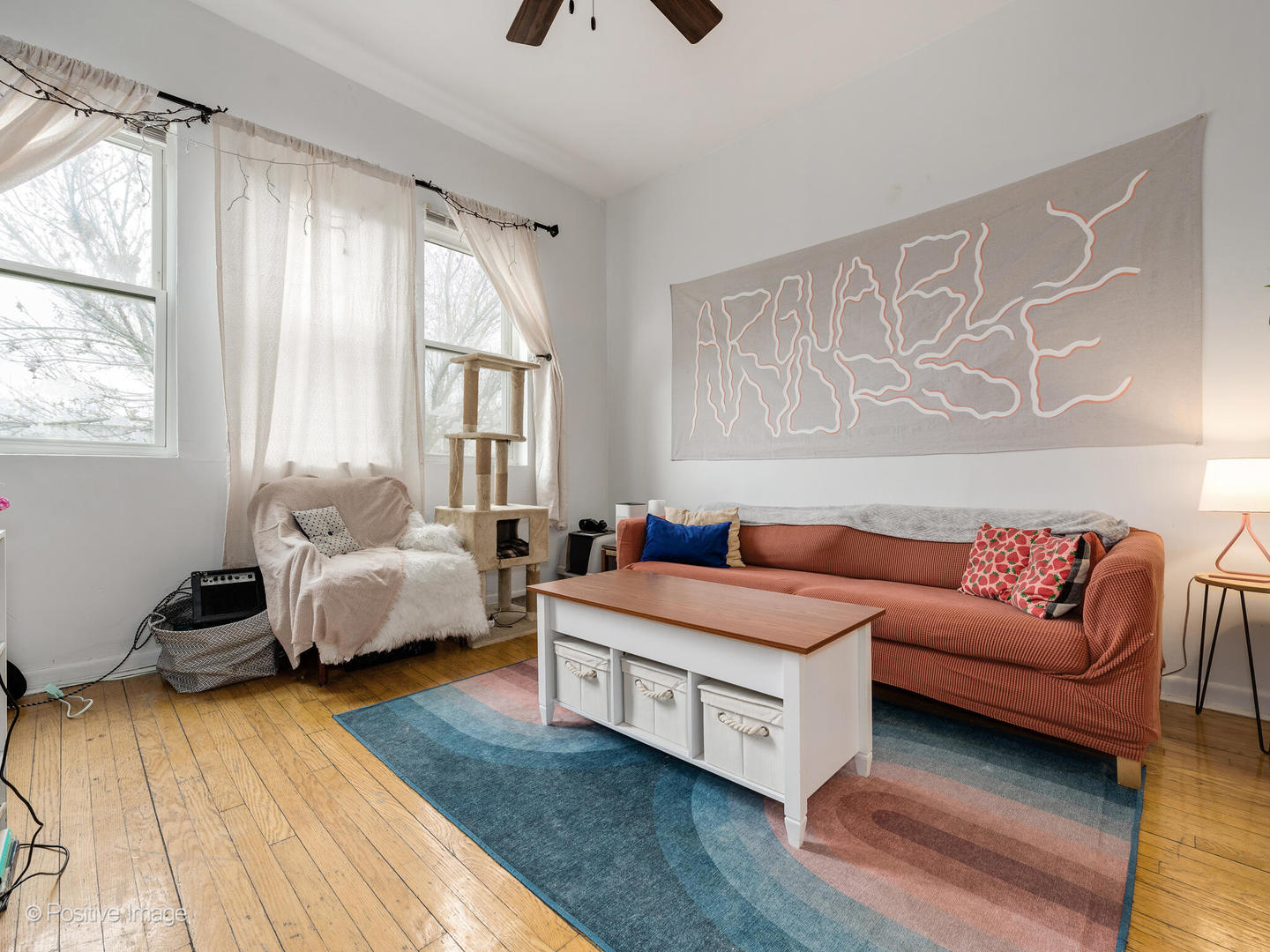 2620 West Homer Street Chicago, IL 60647 - Photo 2 of 31 a spacious bedroom with a bed and a couch