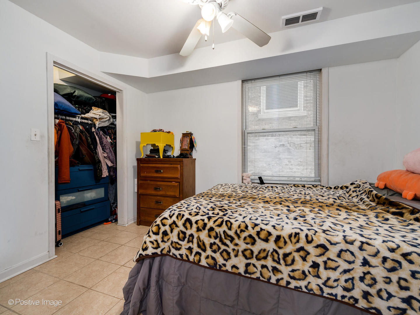 2620 West Homer Street Chicago, IL 60647 - Photo 22 of 31 a bedroom with a bed and a closet