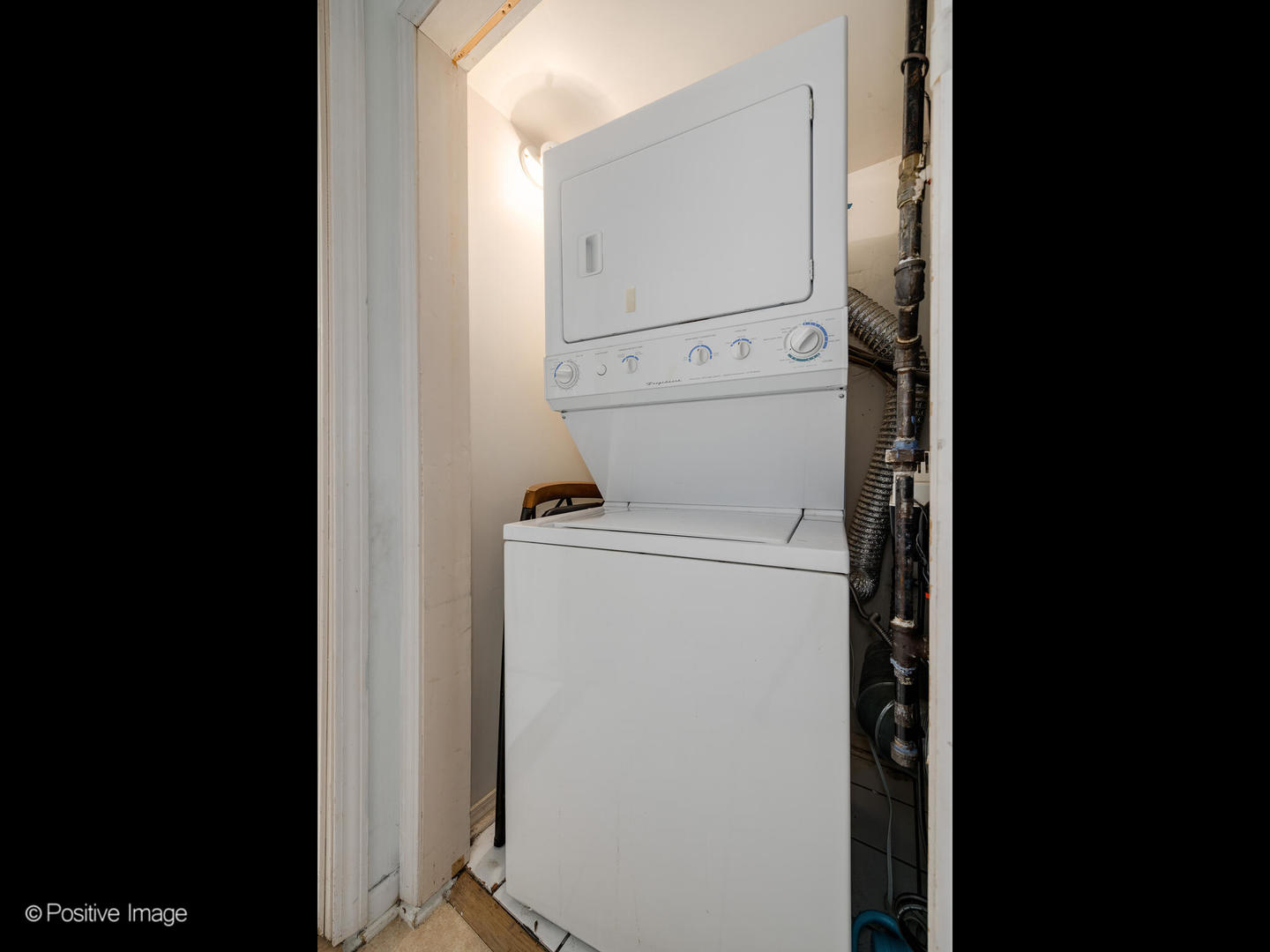 2620 West Homer Street Chicago, IL 60647 - Photo 25 of 31 a close up view of a washer and dryer