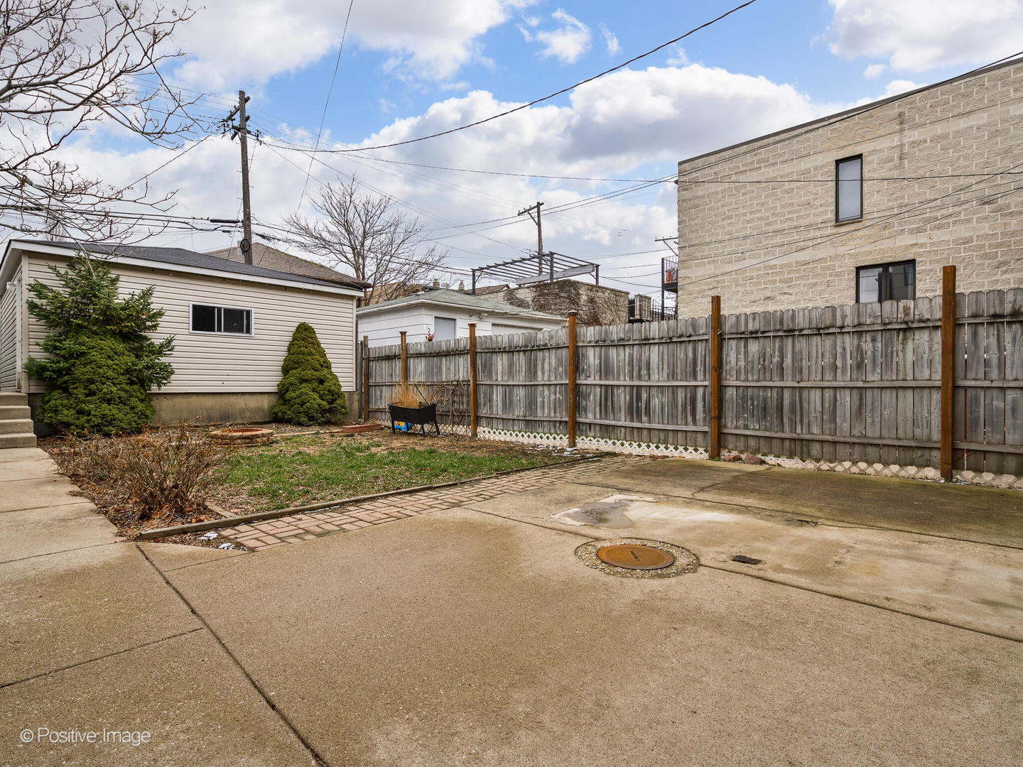 2620 West Homer Street Chicago, IL 60647 - Photo 26 of 31 a view of a house with a backyard