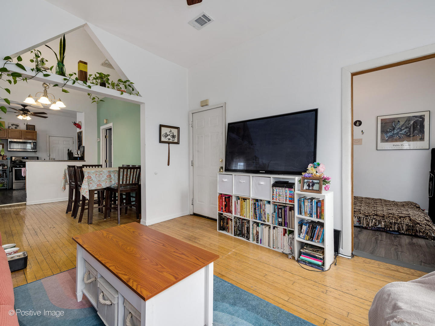 2620 West Homer Street Chicago, IL 60647 - Photo 3 of 31 a living room with furniture and a flat screen tv