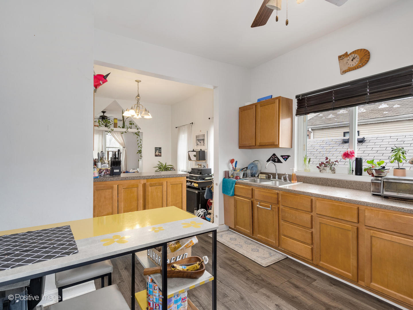 2620 West Homer Street Chicago, IL 60647 - Photo 6 of 31 a kitchen with a sink cabinets and window