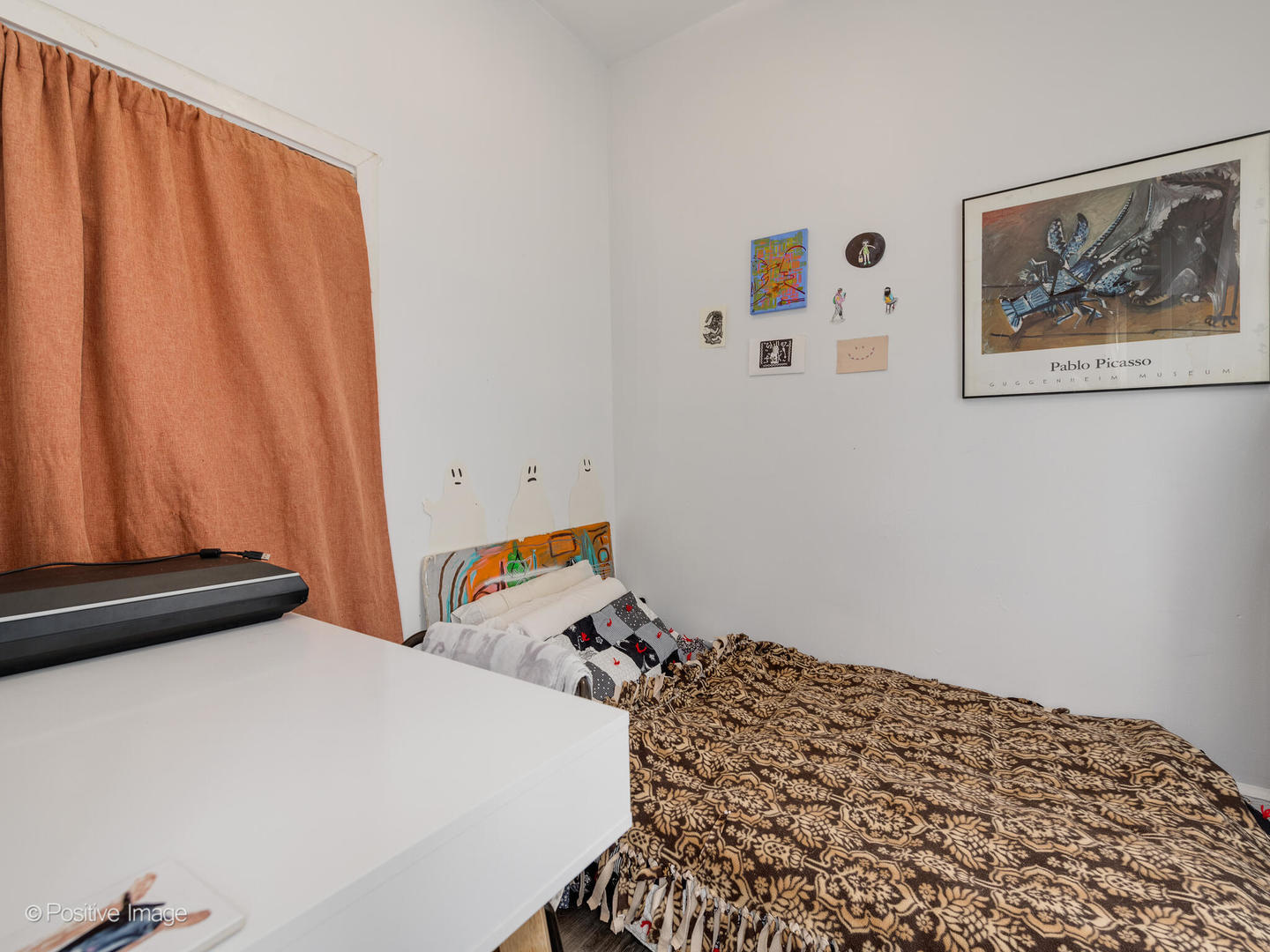 2620 West Homer Street Chicago, IL 60647 - Photo 8 of 31 a bedroom with a bed and curtain