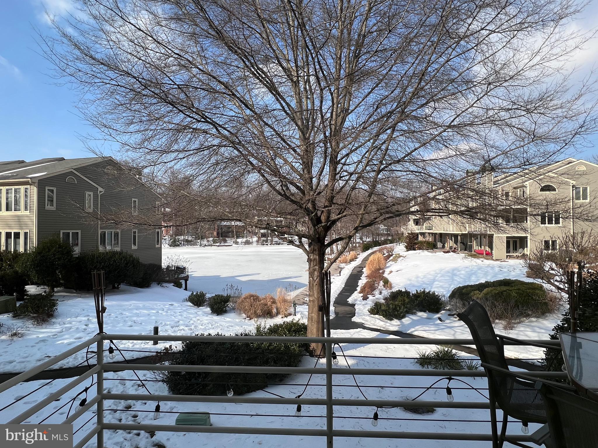 1953 Lakeport Way Reston, VA 20191 - Photo 9 of 11 a front view of a building with outdoor seating