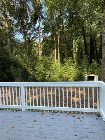 a porch with wooden floor