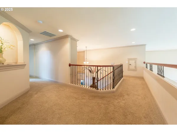 a view of hallway with stairs