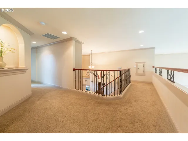 a view of hallway with stairs