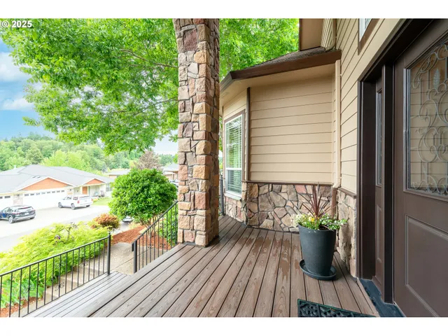 a view of balcony with a potted plant