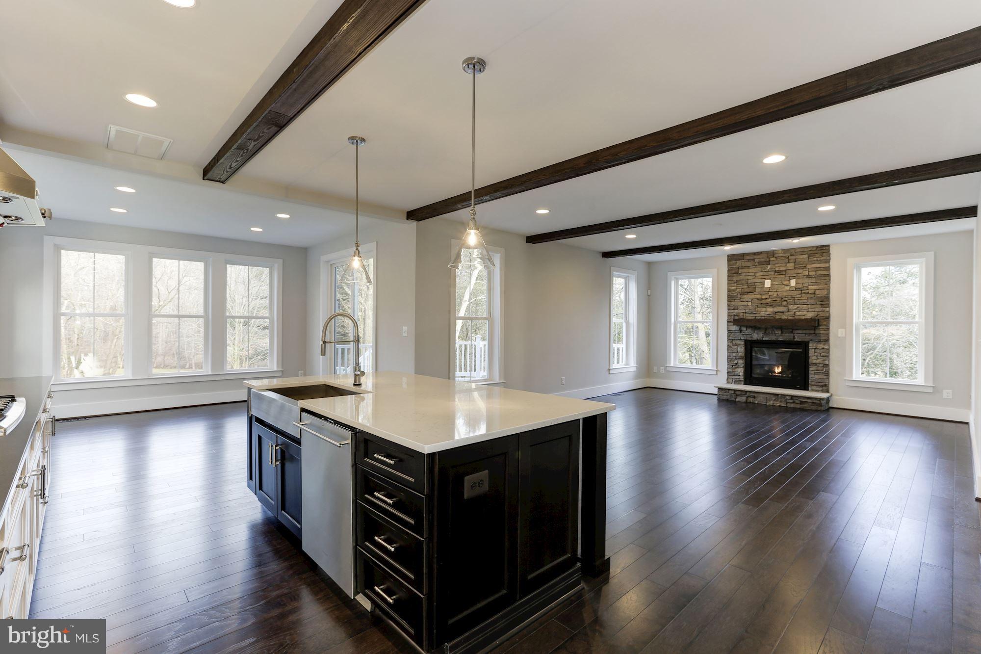11613 Popes Head Road Fairfax, VA 22030 - Photo 9 of 30 Kitchen Opens Seamlessly to Family Room
