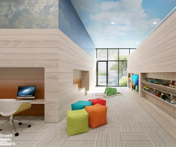 a bedroom with furniture and a large window