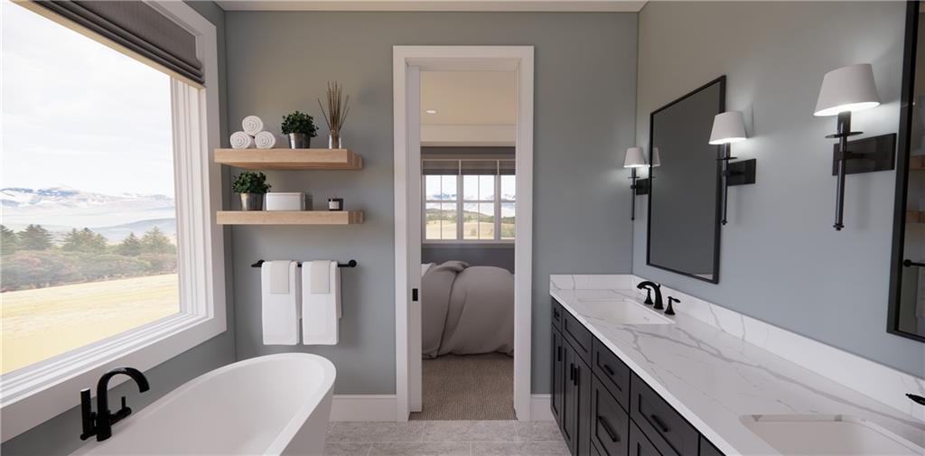 309 Oak Mountain Road Carrollton, GA 30116 - Photo 18 of 38 a bathroom with a double vanity sink a tub and a window