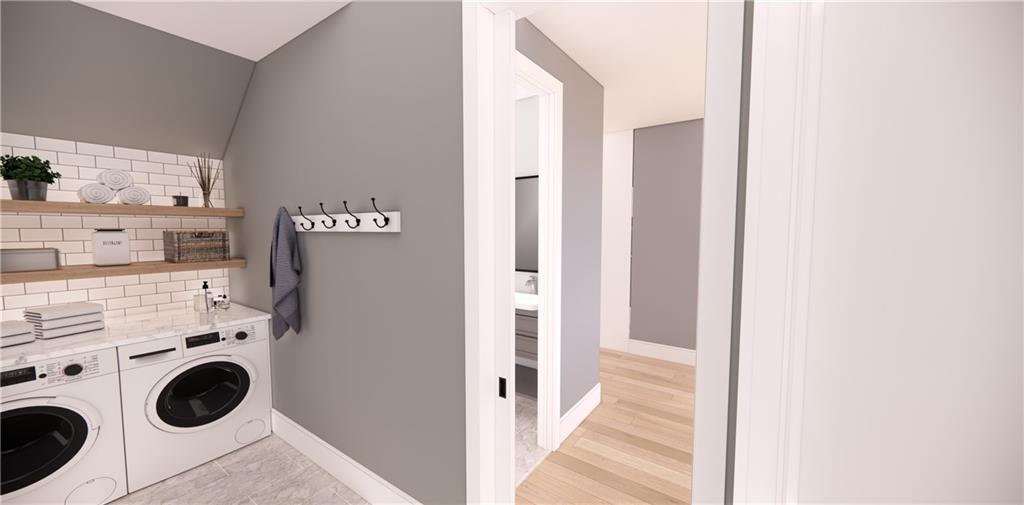 309 Oak Mountain Road Carrollton, GA 30116 - Photo 22 of 38 a view of a kitchen with washer and dryer