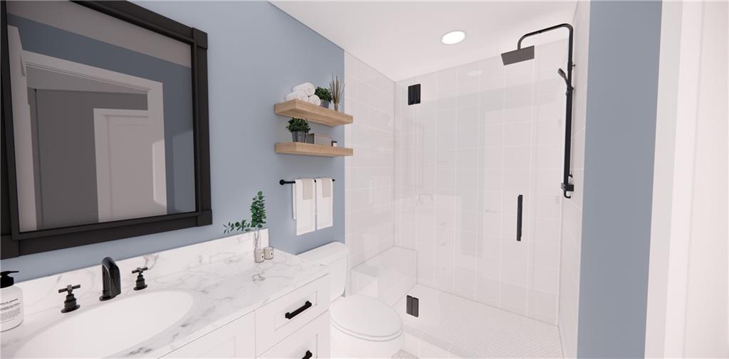 309 Oak Mountain Road Carrollton, GA 30116 - Photo 28 of 38 a bathroom with a sink and a mirror