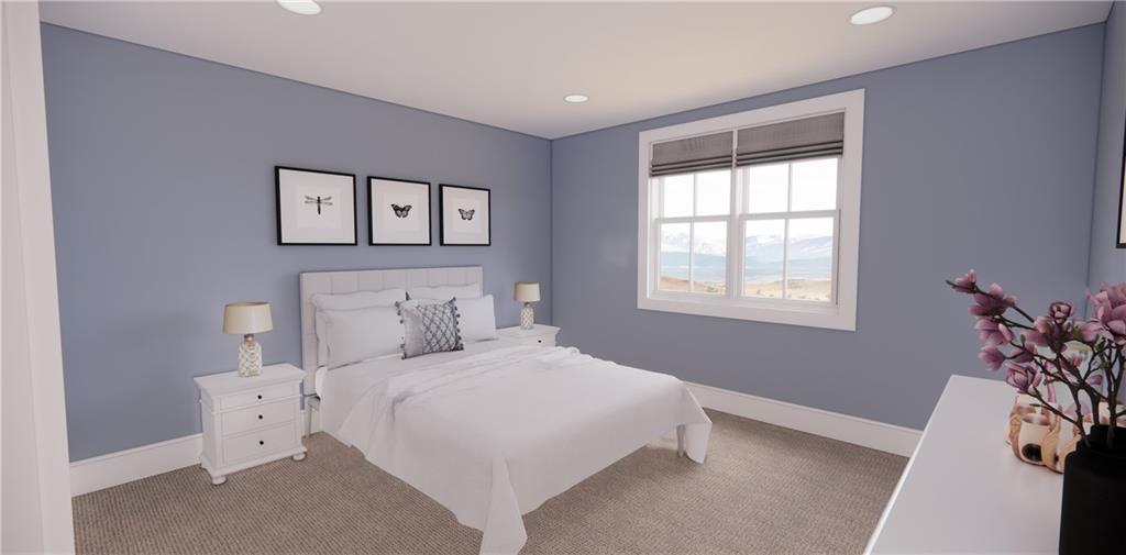 309 Oak Mountain Road Carrollton, GA 30116 - Photo 29 of 38 a bedroom with a large bed and a window