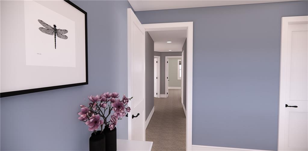 309 Oak Mountain Road Carrollton, GA 30116 - Photo 31 of 38 a view of a hallway with wooden floor and a potted plant