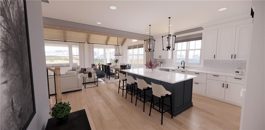 309 Oak Mountain Road Carrollton, GA 30116 - Photo 9 of 38 a large kitchen with kitchen island a large window in it