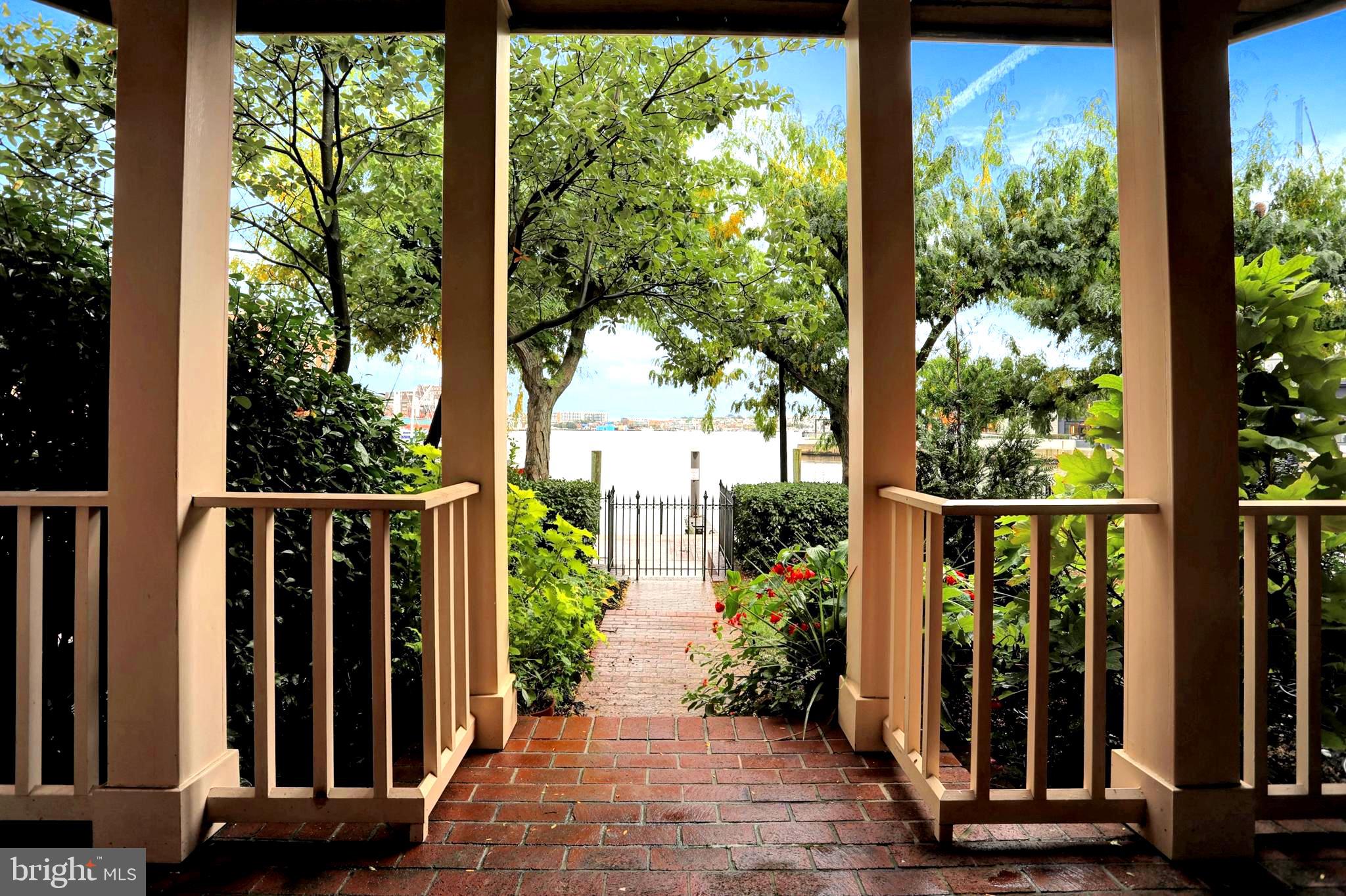 a view of a balcony with garden