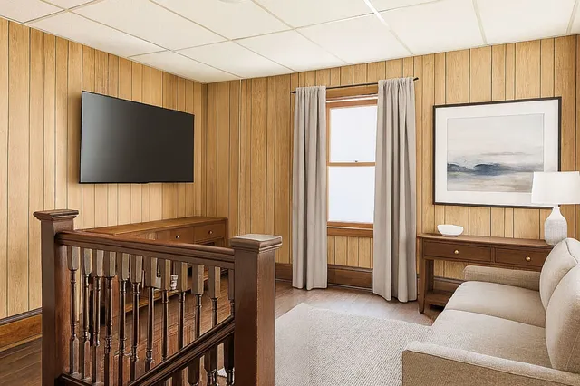 a bathroom with a toilet a sink and window