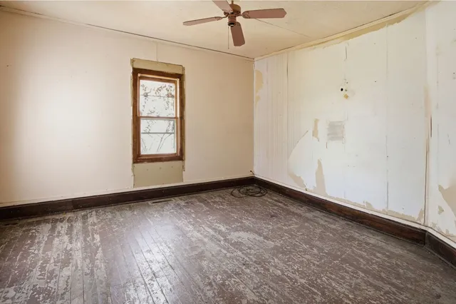 an empty room with windows