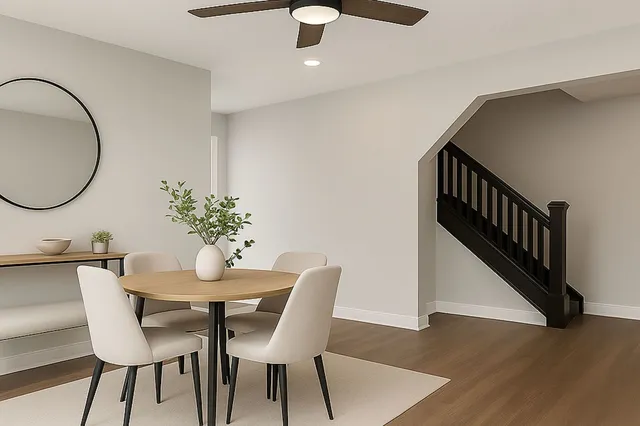 a view of a livingroom with furniture and a window