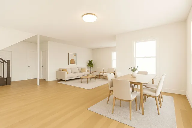 a dining room with furniture and window