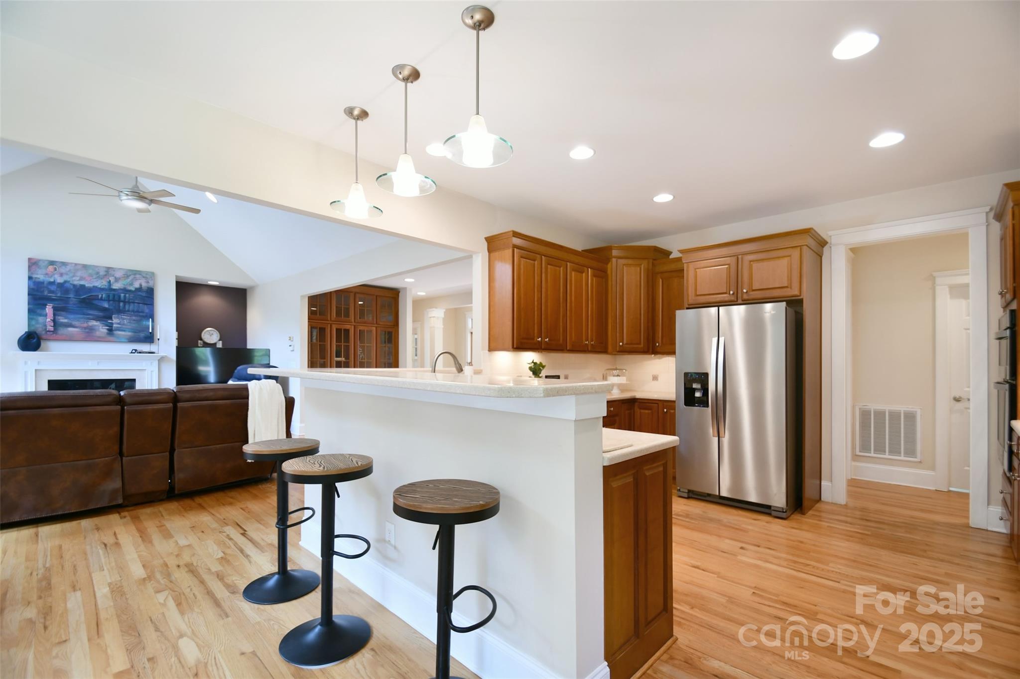 14832 Hus McGinnis Road Huntersville, NC 28078 - Photo 11 of 48 a kitchen with cabinets and chairs