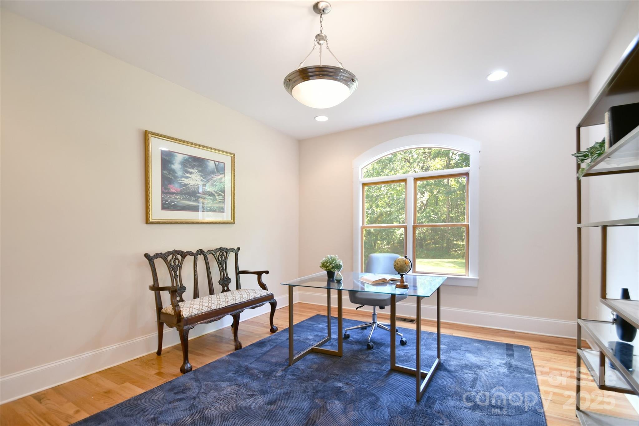 14832 Hus McGinnis Road Huntersville, NC 28078 - Photo 19 of 48 a living room with furniture and a window