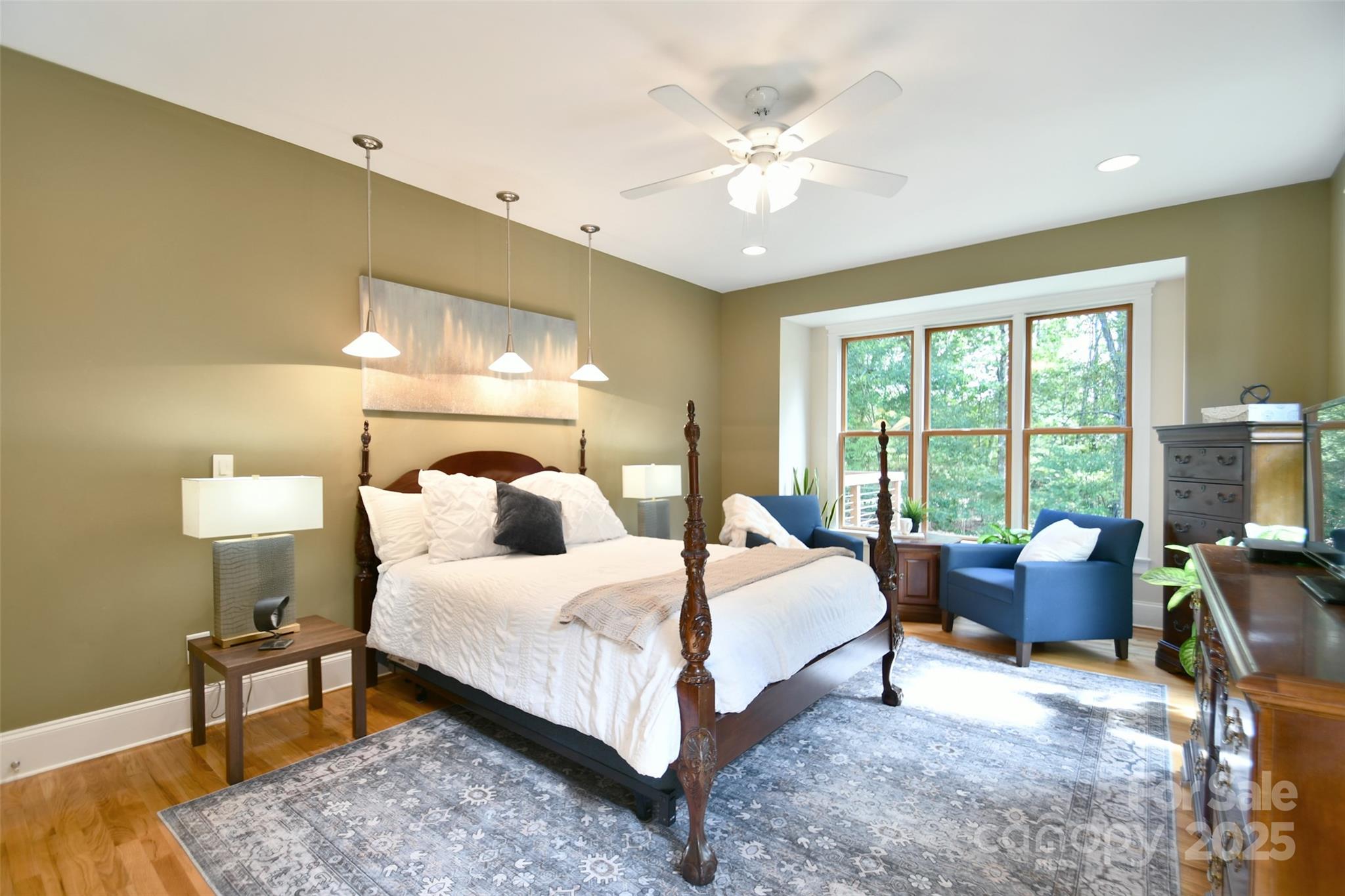 14832 Hus McGinnis Road Huntersville, NC 28078 - Photo 21 of 48 a bedroom with a bed and large window