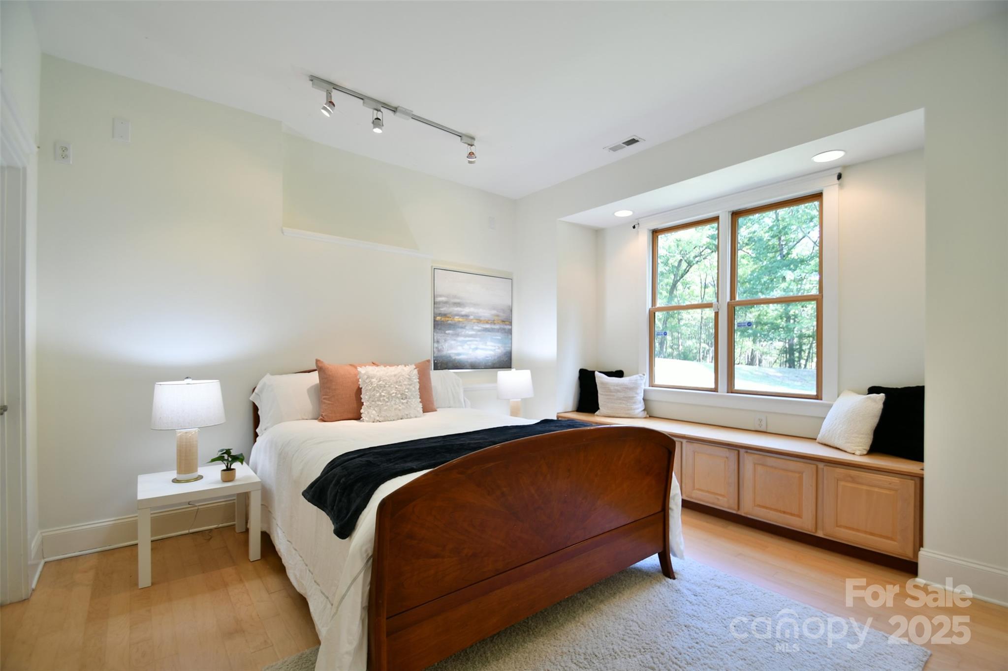 14832 Hus McGinnis Road Huntersville, NC 28078 - Photo 32 of 48 a bedroom with a bed and a couch with window