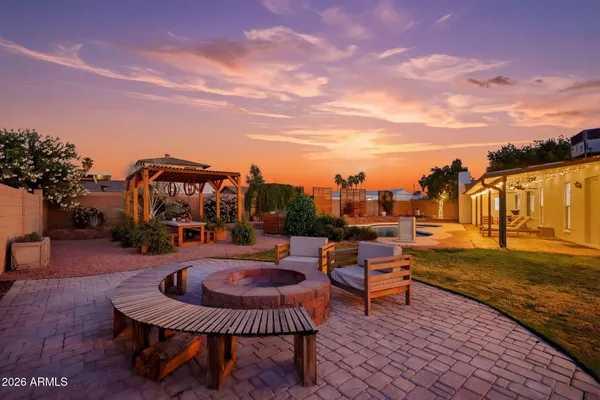 a chairs and table on the terrace