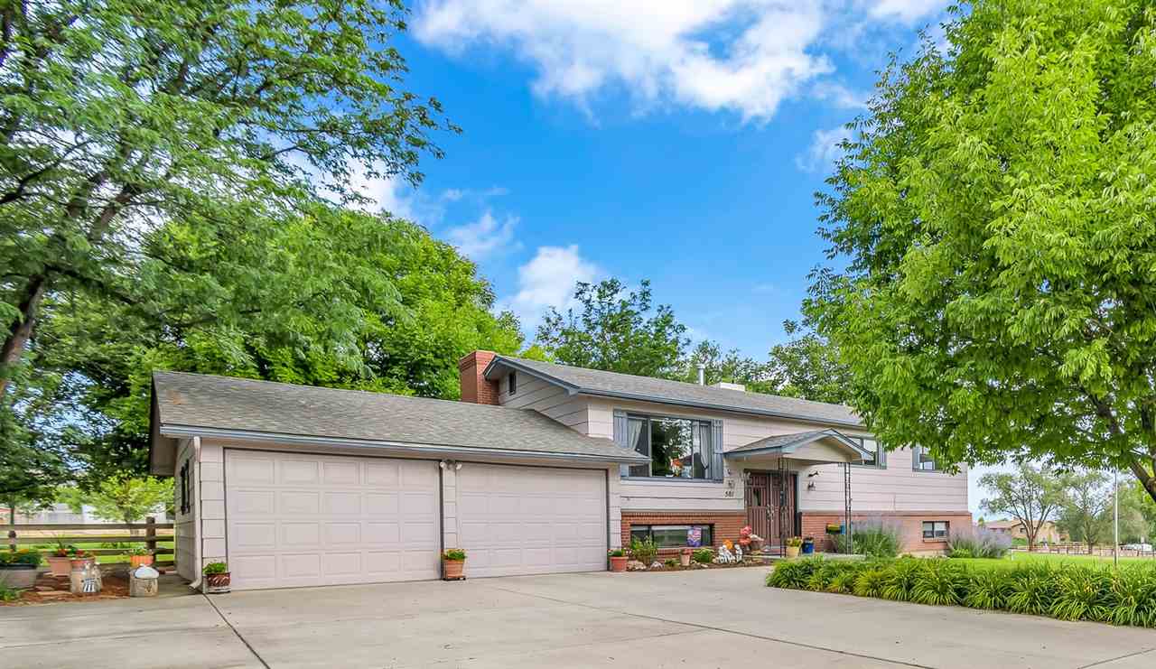 a house view with a outdoor space