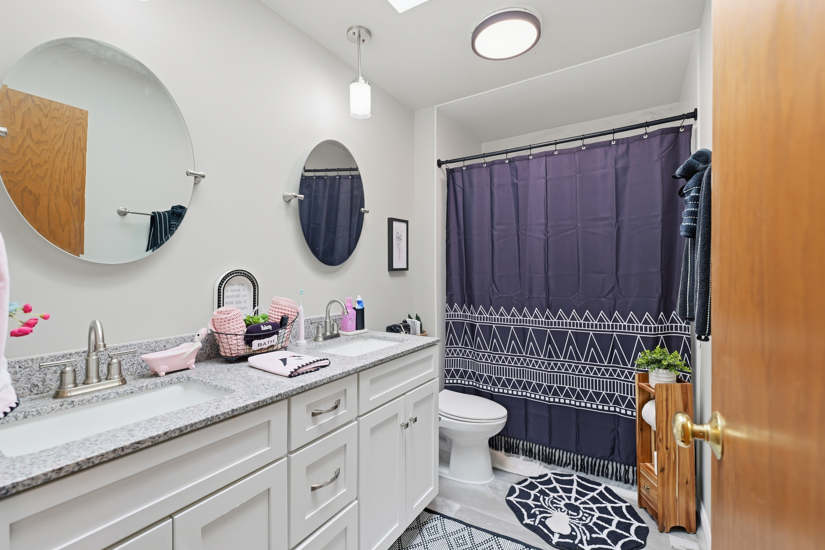 27805 South Klemme Road Crete, IL 60417 - Photo 14 of 29 a bathroom with a granite countertop bathtub a sink and a mirror