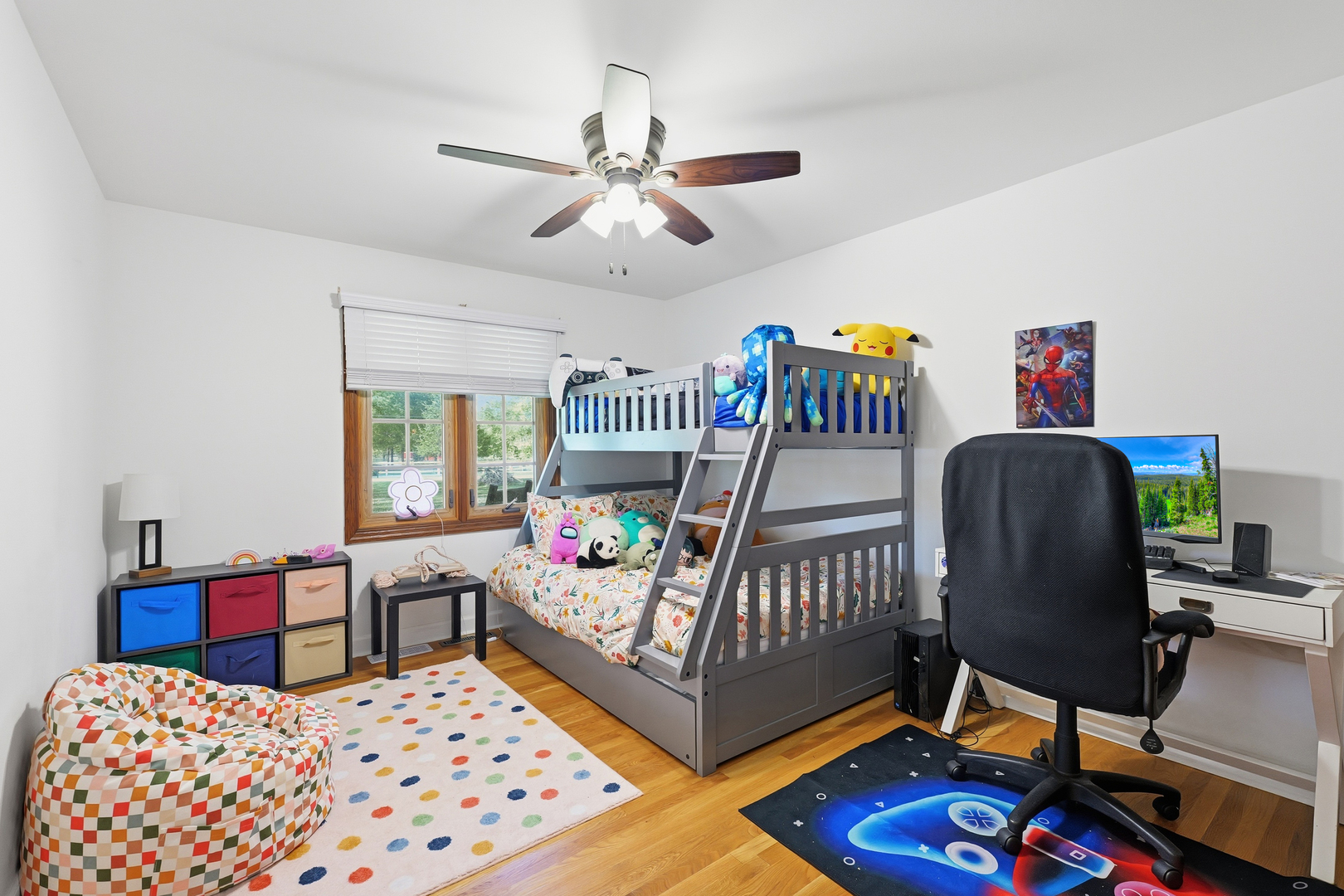 27805 South Klemme Road Crete, IL 60417 - Photo 15 of 29 a bedroom with a bed a books bucket with a desk and chair