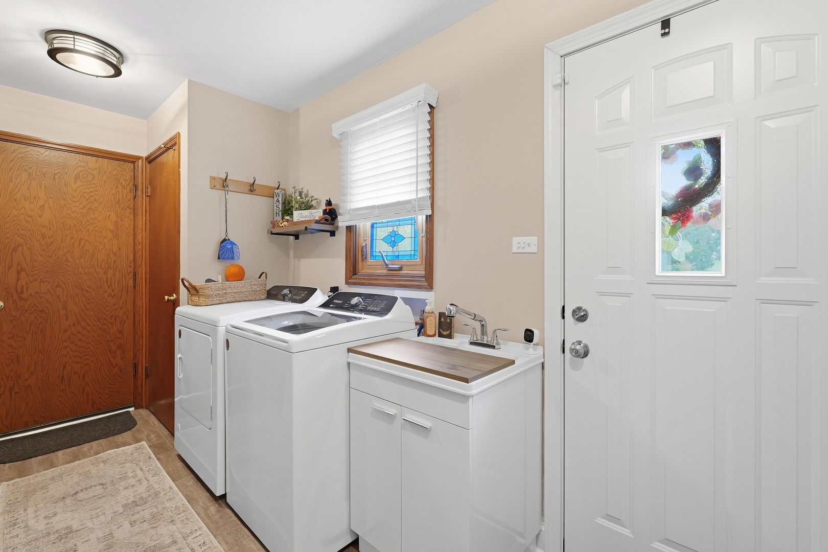 27805 South Klemme Road Crete, IL 60417 - Photo 21 of 29 a view of storage and utility room with washer and dryer