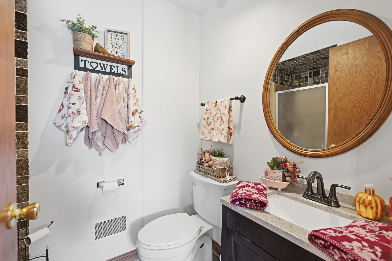 27805 South Klemme Road Crete, IL 60417 - Photo 22 of 29 a bathroom with a toilet sink vanity and mirror