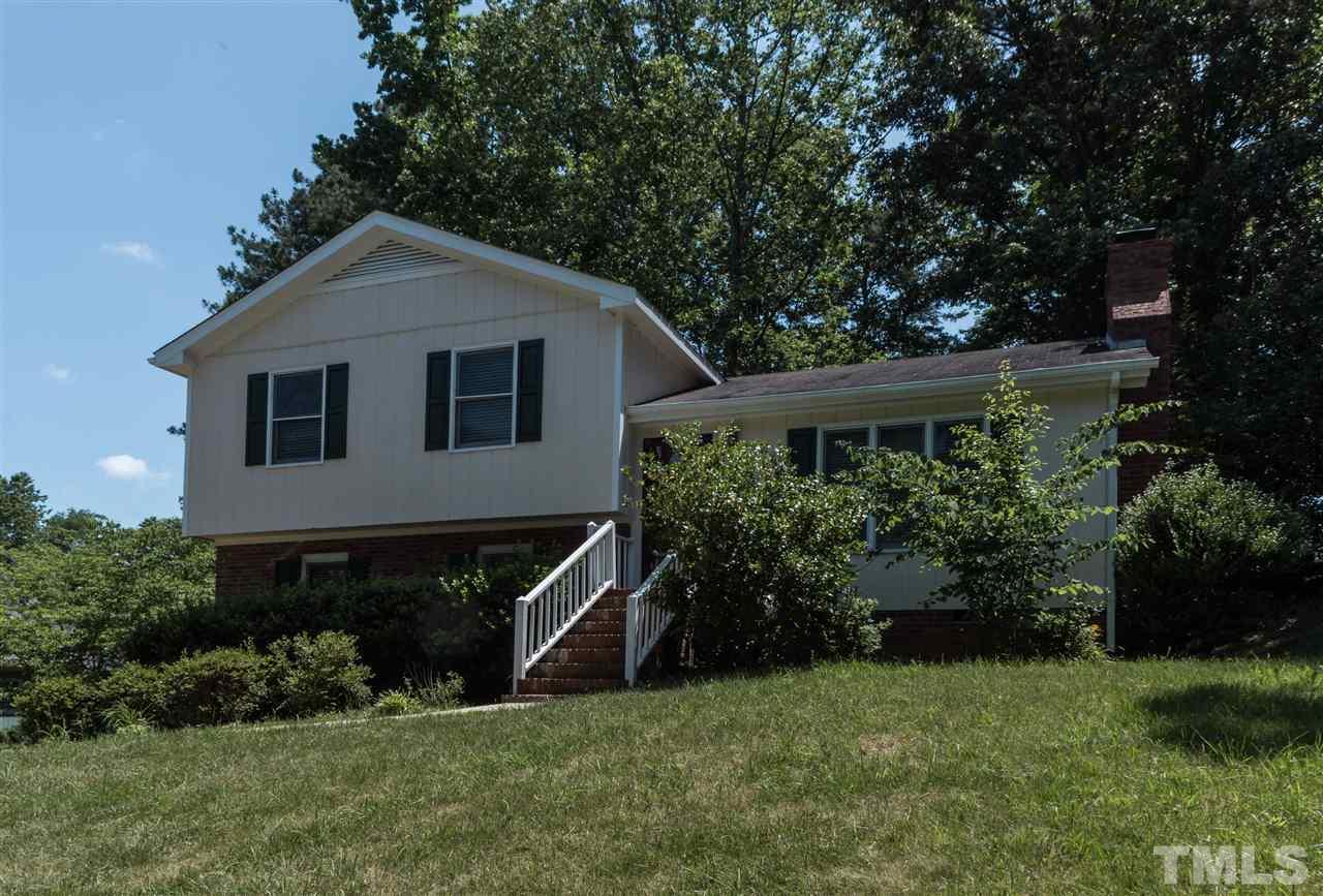 6812 Glendower Road Raleigh, NC 27613 - Photo 23 of 23 a front view of a house with a yard