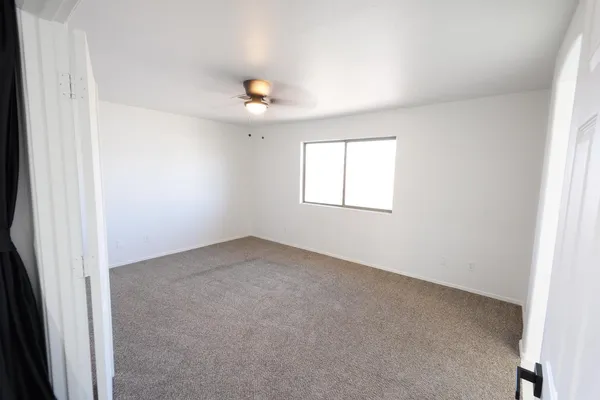 an empty room with windows