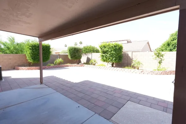 a view of backyard with green space