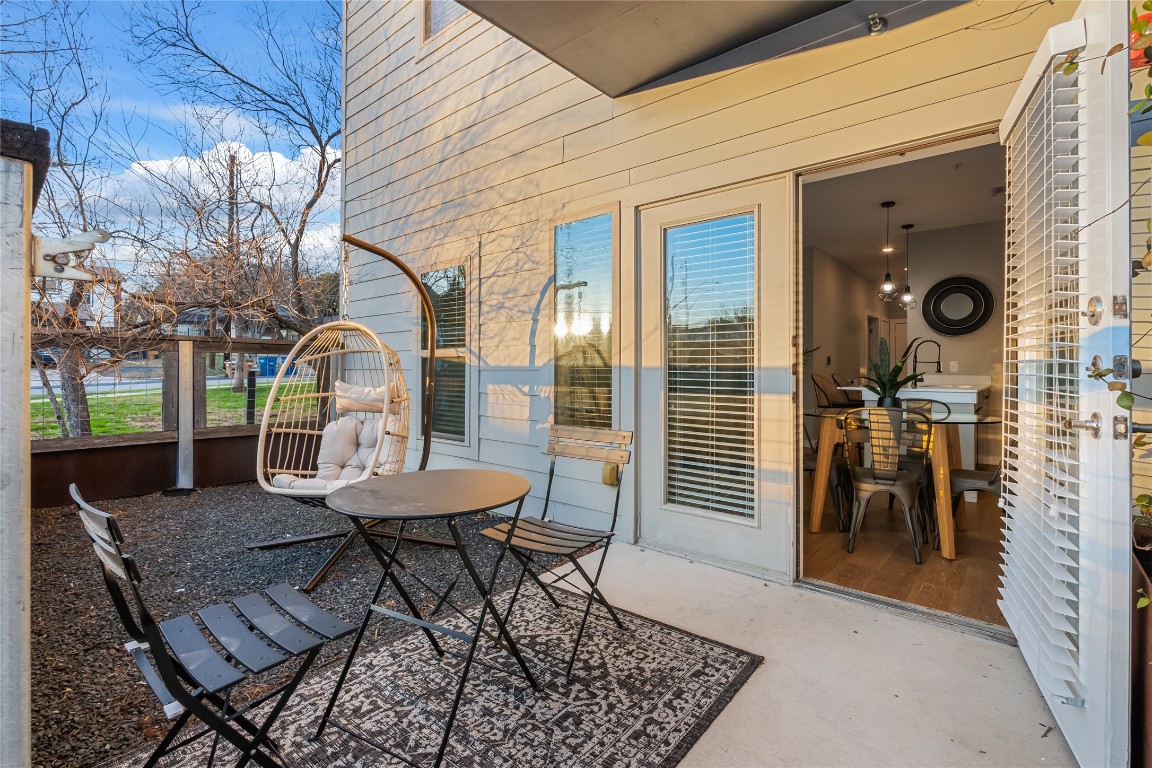 2505 Thornton Road, Unit 2208 Austin, TX 78704 - Photo 10 of 23 a view of a patio with a table and chairs