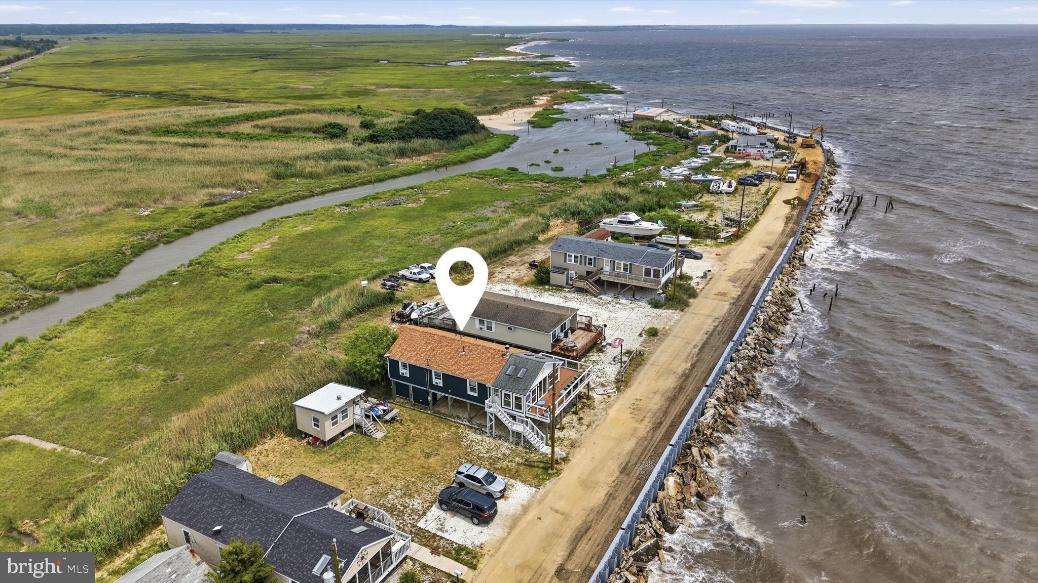 173 Cove Road Newport, NJ 08345 - Photo 60 of 72 a view of an ocean from a balcony
